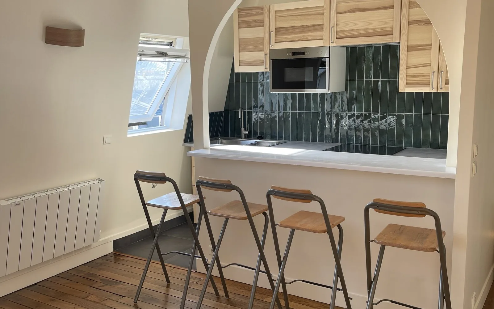 Cuisine après rénovation par TerraRenova — réagencement complet, plan ouvert