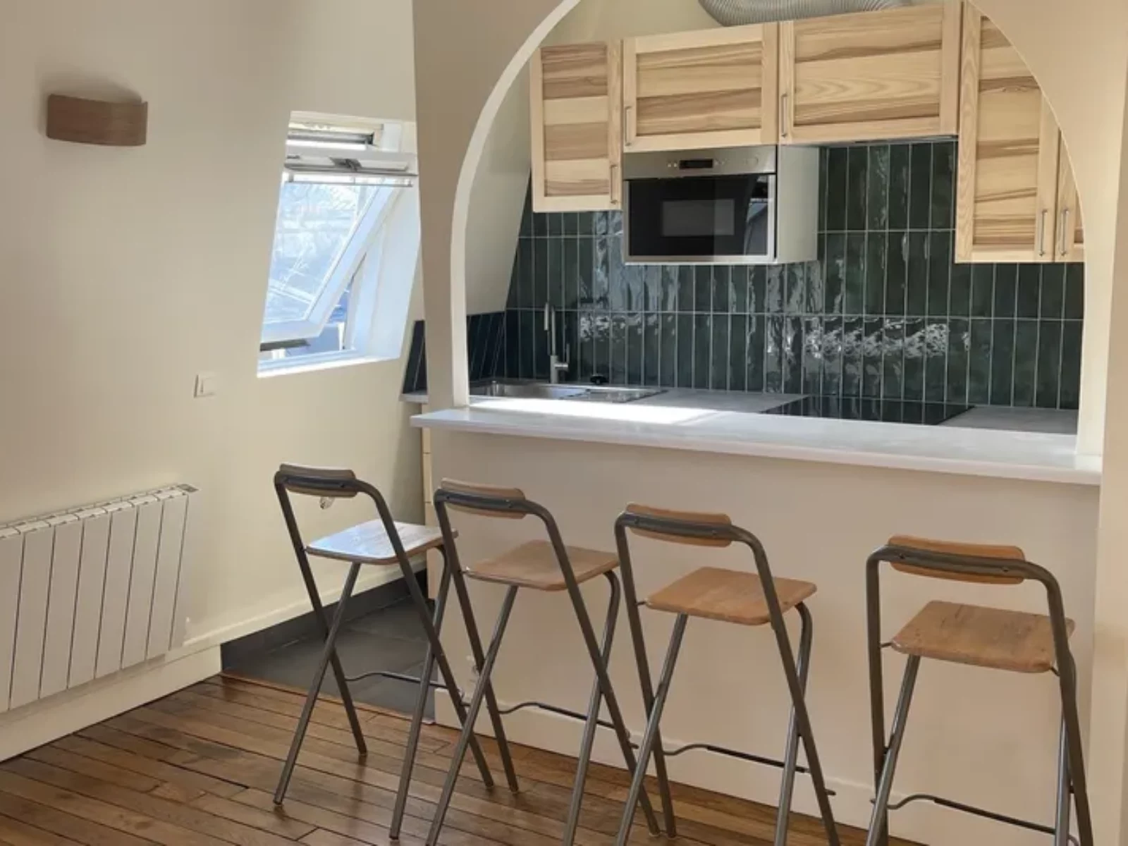 Cuisine ouverte après rénovation TerraRenova — appartement 37 m² à Paris